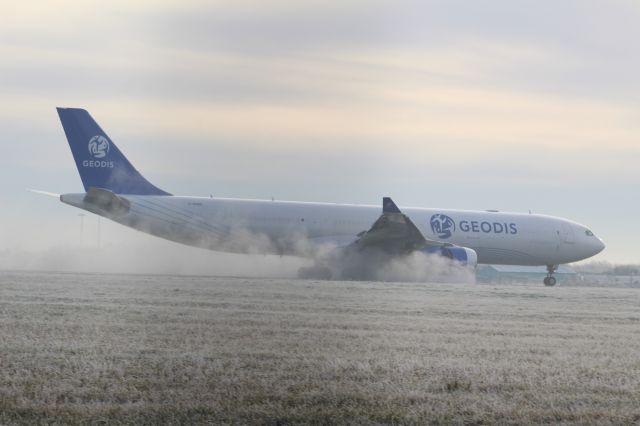 Airbus A330-300 (G-EODS) - A Geodis (operated by Titan Airways) A330-300P2F slowing down after landing at Stansted Airport.br /br /Location: Belmer Road, Stansted.br /Date: 11.12.22 (dd/mm/yy).