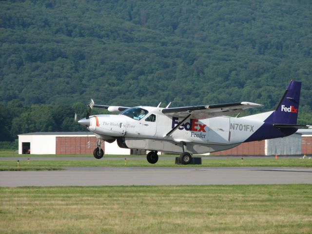 Cessna Caravan (WIG356) - Arriving on a very nice summer morning.