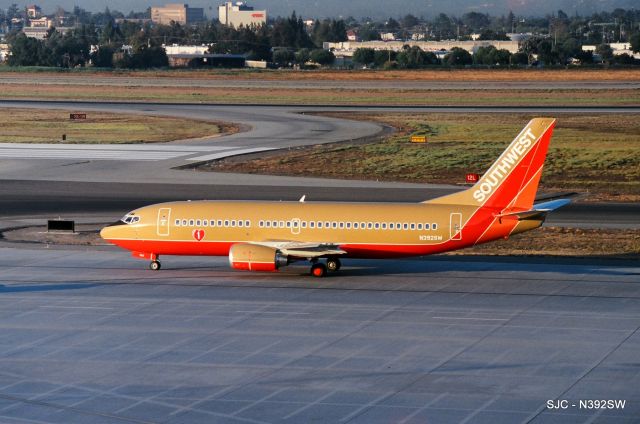 BOEING 737-300 (N392SW) - KSJC Southwest 737-300 set to roll to 30L - photo from atop the parking structure before SJC officials ruined the view and adding more buildings...