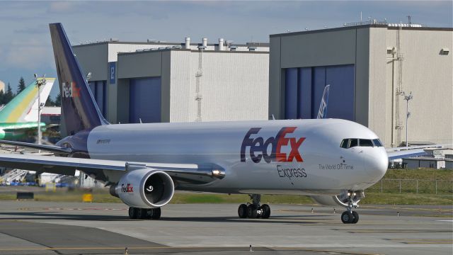 BOEING 767-300 (N107FE) - BOE561 taxis onto Rwy 16R for its first flight test on 9/19/14. (LN:1___ / cn 44377).