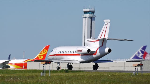 Dassault Falcon 900 (N966E) - A Dassault Falcon 900 EX (Ser#126) during its takeoff roll on runway 34L on 5/1/13.