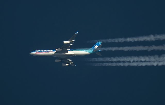 Airbus A340-300 (F-OJGF) - 27/12/2015 Air Tahiti Nui A340-300 F-OJGF passes overhead Lancashire,England,UK at 34,000ft working route CDG-LAX-PPT THT7.br /One of my favorite livery schemes,this aircraft is so far away from home. This paint job certainly looks great on this A340 as she effortlessly powers her way through the winter sky.