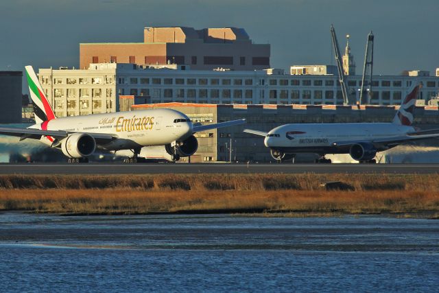 Boeing 777-200 (A6-EWG) - Emirates 239 heavy lands runway 4R, as Speedbird 29 golf holds on runway 9