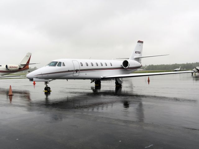 Cessna Citation Sovereign (N370QS) - 28 June 2015. A rainy, windy day at Bar Harbor.