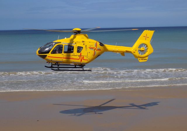 G-HEMN — - Taken from Cromer promenade, the aircraft circled for twenty minutes while Coastguards cleared a landing area, it was called to assist a young male who fell backwards from one of the steps banging his head.