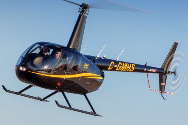 Robinson R-44 (C-GMHS) - Landing at Customs in Calgary. 