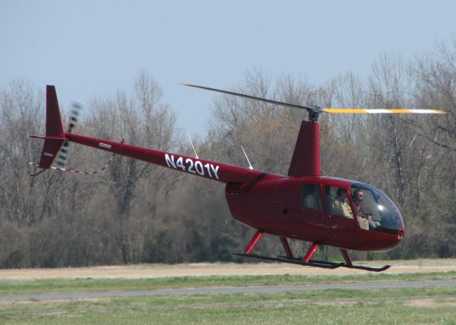Robinson R-44 (N4201Y) - Lifting off from the Shreveport Downtown airport.
