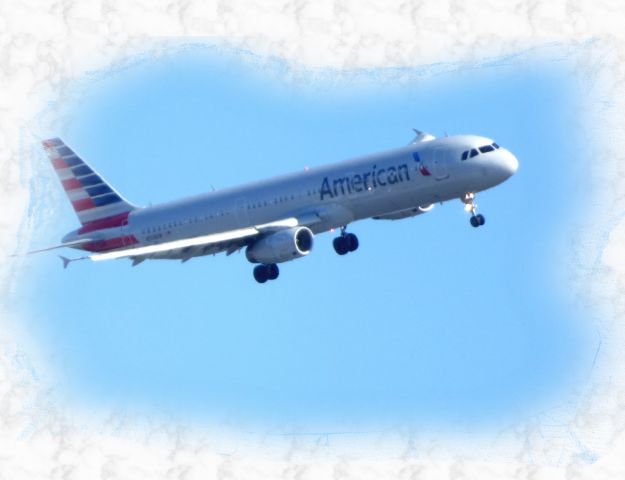 Airbus A321 (N558UW) - Shown here is an American Airlines Airbus A321 on final in the WInter of 2018.