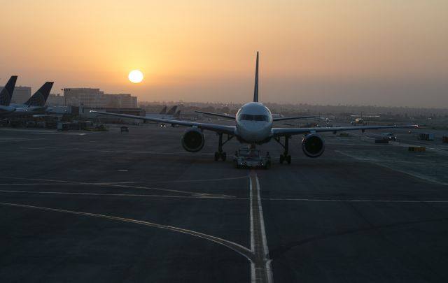 Boeing 757-200 — - Pushback for morning departure from gate at LAX