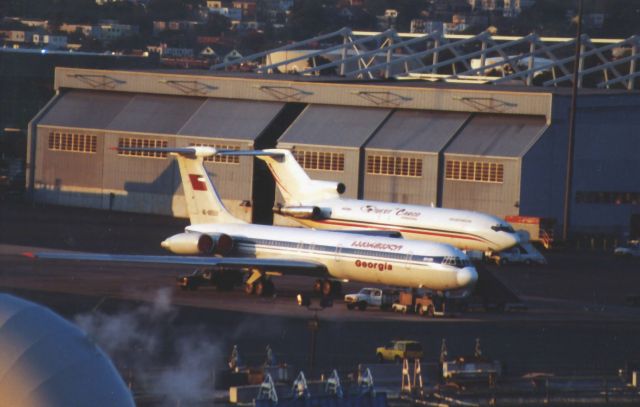 Ilyushin Il-62 (4L86558) - IL 62 next to a B-727