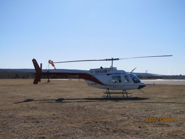Bell JetRanger (C-FDOD) - Owned by Transport Canada and is parked the Kings County Municipial Airport  Waterville NS