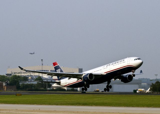 Airbus A330-300 (N270AY) - Evening takeoff for London, Gatwick from Charlotte, North Carolina, USA. Runway 18L, 18:50, 8 June 2011