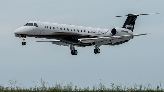 Embraer ERJ-145 (N509RH) - On final to runway 22 at Wilkes Barre/Scranton international airport and Embraer E145(owned by Hendrick Motorsports) lands. 