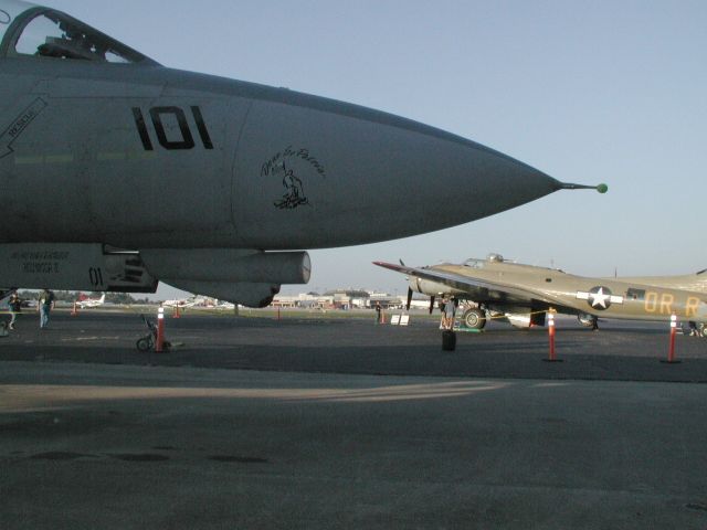 Boeing B-17 Flying Fortress (N93012) - 101, a retired F-14 from VF-32 stands watch over 909 (N93012), a Collings Foundation B-17G during a visit to ta href=http://www.aviationky.org/The Aviation Museum of Kentucky/a.