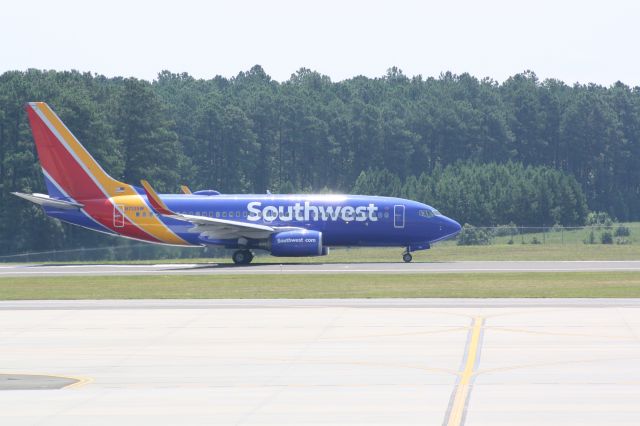 Boeing 737-700 (N713SW) - N713SW starting takeoff roll runway 23L