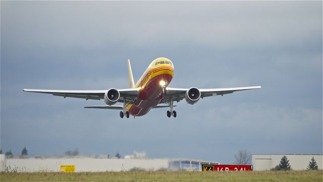 BOEING 767-300 (G-DHLK) - DHK123F climbs from runway 16R beginning its delivery flight to CYXX on 11/21/12. (LN:1041 c/n 37810).