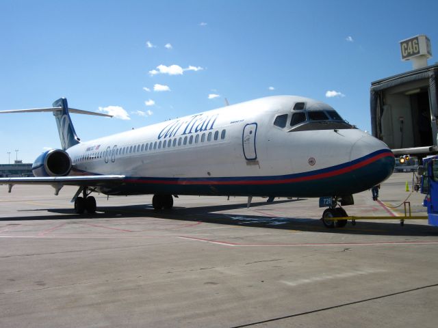 Boeing 717-200 (N967AT) - Parked at a C concourse gate at DIA.