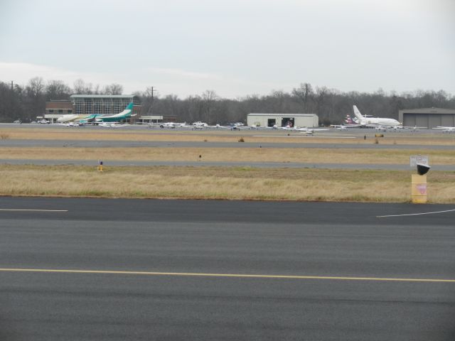 Embraer ERJ-190 (N760CC) - The Two Giant Monsters At Manassas, On The Right Side Is VP-CDA, A Boeing B737-200 That Sits Over There For Over A Year! On The Left Is N760CC, A Rare Visitor, An Embraer E-190 Owned By Chris Kline, A Billionaire!