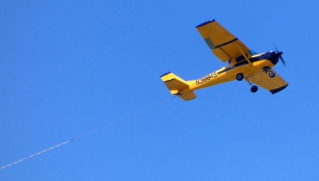 Cessna Commuter (N3084S) - Circling around the Philadelphia Phillies Baseball park is the 1967 Cessna Commuter 150G configured as a Tow plane today in the Spring of 2019. The home team won today. Go Phillies! No clue on where the plane flew out of.