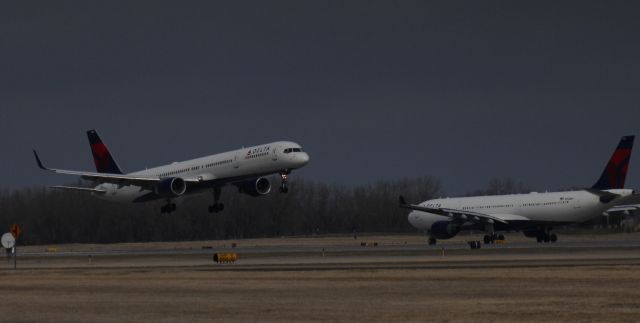 BOEING 757-300 (N588NW) - 032616 inbound Delta B757 on Rwy 12R passes outbound A330