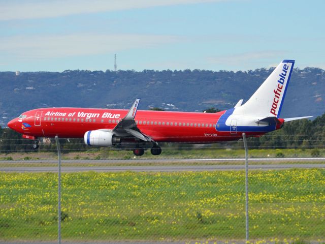 Boeing 737-800 (VH-VOX) - About to put down on runway 05. Thursday 12th July 2012.