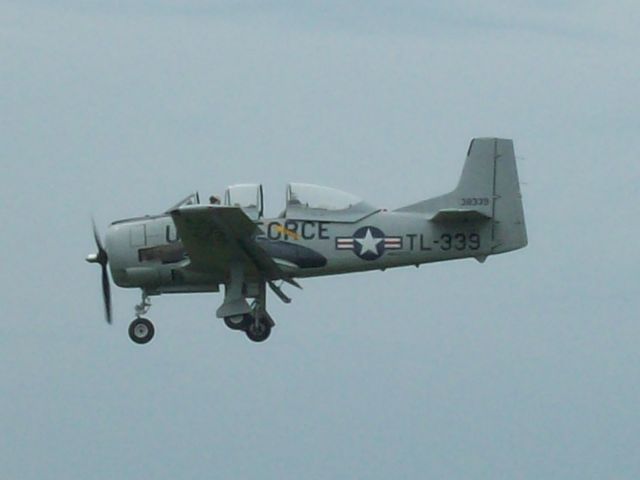 — — - After practicing his airshow routine this T-28 is seen on short final RWY18 at SPI