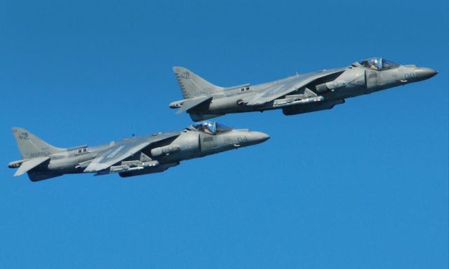 — — - Marine Harriers jet from pass over the crowds, in show pass during fleet week, San Francisco Ca.,