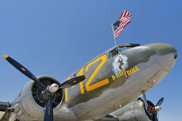 — — - "D-Day Doll", a C-53 Skytrooper aircraft, a version of the Douglas C-47 Skytrain or Dakota, a military transport aircraft that was developed from the Douglas DC-3 airliner, here seen at  the 2012 March Field Airfest in Riverside, California