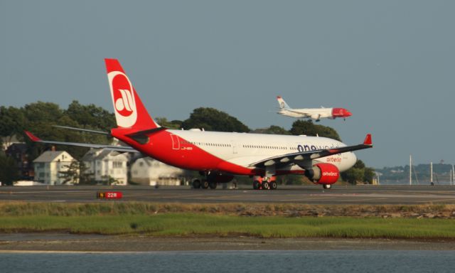 Airbus A330-200 (D-ABXA) - Air Berlin A332 in One World livery about to depart while NAX Dreamliner about to land in back. This would be the first time AB brought their One World livery aircraft to BOS.