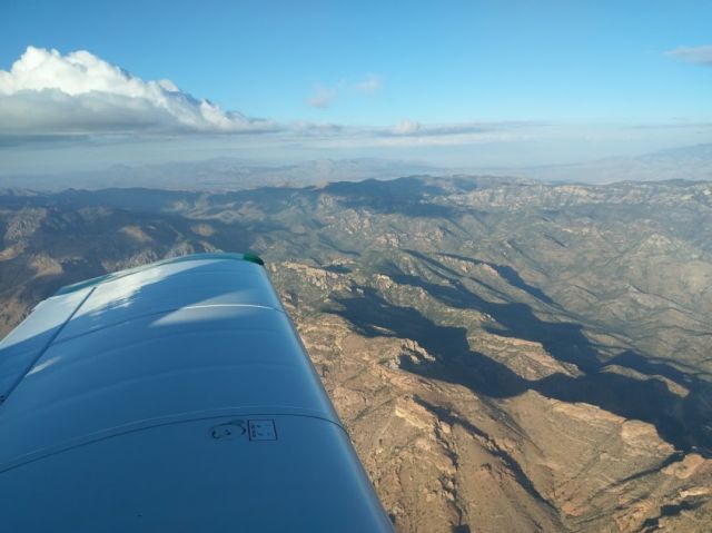 N451CD — - Crossing the hills on the way home.