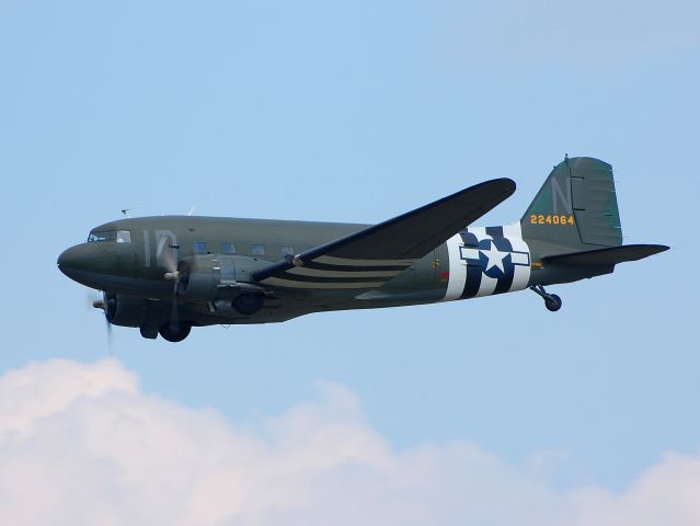 Douglas DC-3 (N74589) - Repainted in its original WW2 D-Day C-47 scheme, N74589 returns to KOXC from Oshkosh on 08022011.