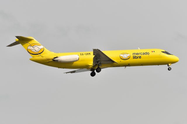 McDonnell Douglas DC-9-30 (XA-URM) - Got to love these guys and their beautiful DC-9's. This one is shown arriving 23-L at IND on 08-09-21. First shot of this bird in this colorful new scheme on the data-base. Mercado Libre means "Free Market"