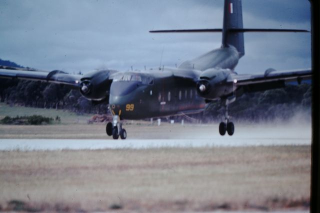 De Havilland Canada DHC-4 Caribou (A4199) - RAAF carabou conducting STOL training RWY 23, circa1982