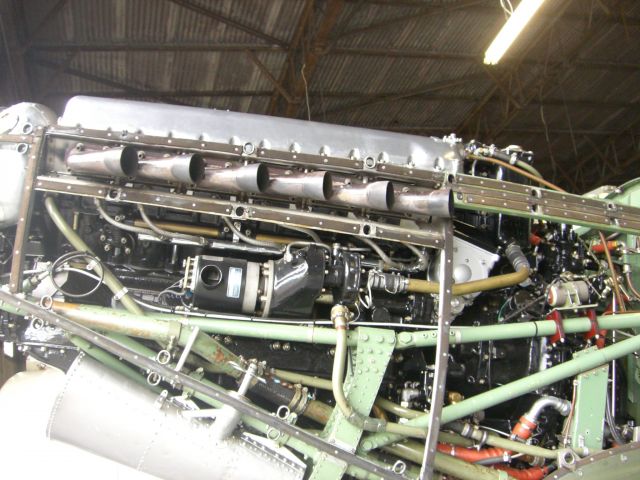 — — - Close up of a Spitfire engine
