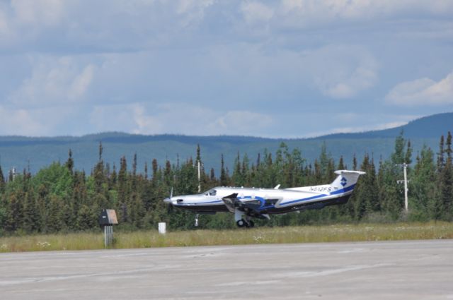 Pilatus PC-12 (N812FS) - Taking off runway 26