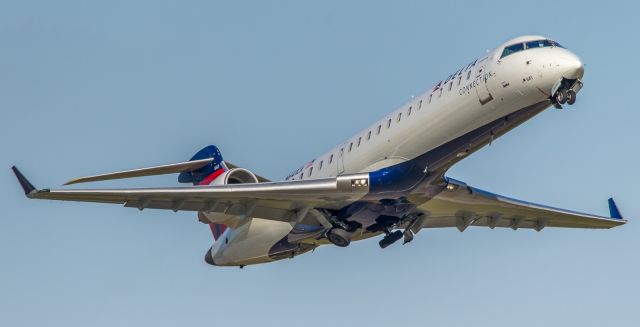 Canadair Regional Jet CRJ-900 (N641CA) - This SkyWest CRJ900 rockets off runway 21L at KDTW