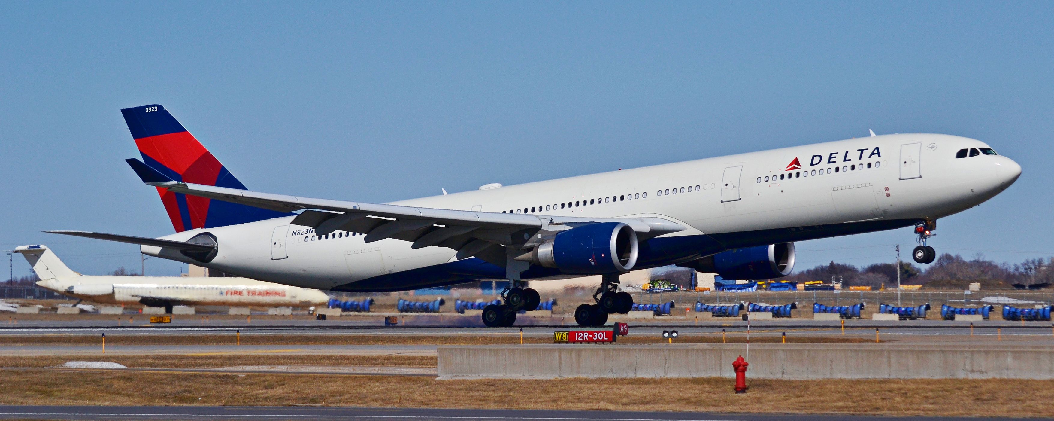 Airbus A330-300 (N823NW) - Delta Airlines A330 landing on 12R, Northwest was the original purchaser of the A330 prior to the Delta / Northwest merger.