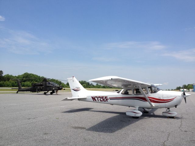 Cessna Skyhawk (N72EF) - Apache AH-64 behind N72EF in Hickory, NC.