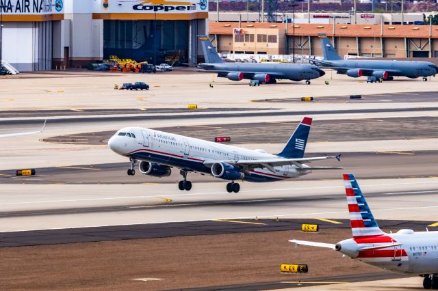 Airbus A321 (N578UW) - American Airlines A321 in US Airways retro livery taking off from PHX on 12/16/22. Taken with a Canon R7 and Tamron 70-200 G2 lens.