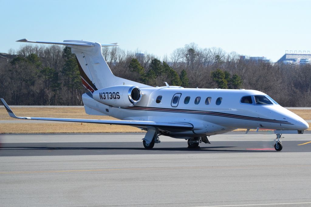 Embraer Phenom 300 (N373QS) - NETJETS SALES INC at KJQF - 1/31/18
