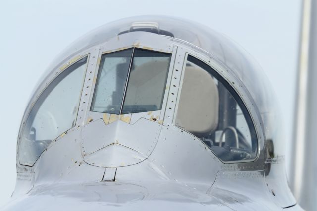 — — - Windshiled and Canopy of a NAA F-86 Sabre.