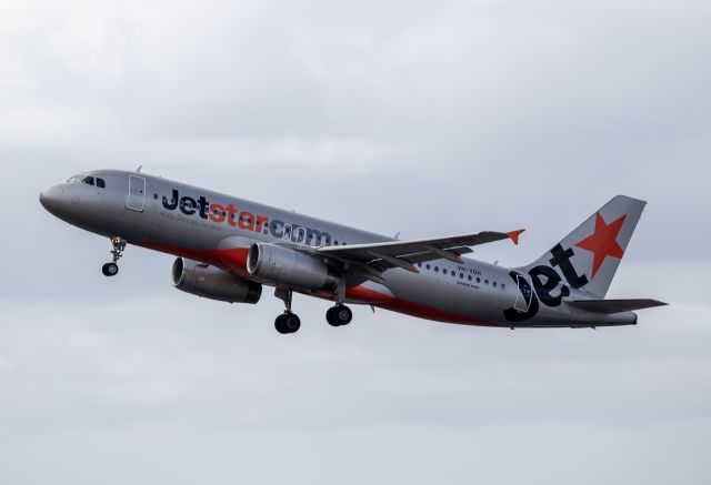 Airbus A320 (VH-VGH) - Departing runway 01R