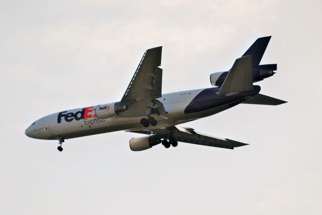 McDonnell Douglas DC-10 (N570FE) - n approach for runway 18C, flying over the West Meck H.S. baseball field - 6/25/15