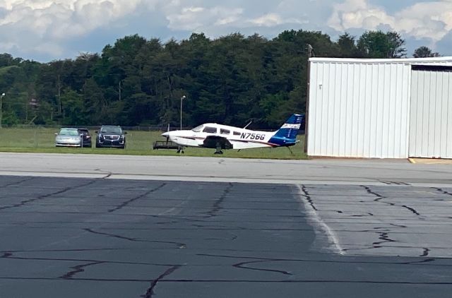 Piper Cherokee (N756G) - Piper 28 parked at the South Ramp