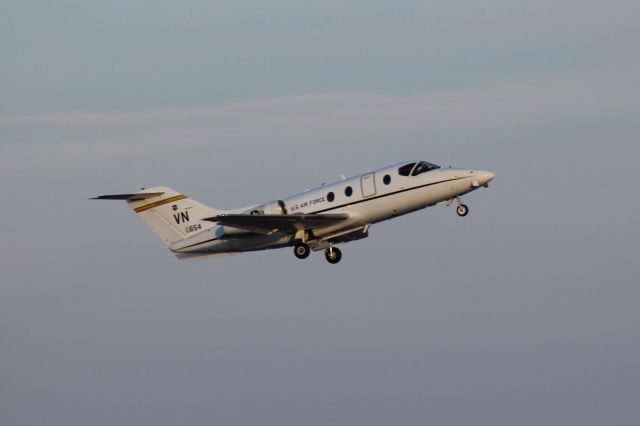 Beechcraft Beechjet (93-0654) - 022414 USAF trainer running the pattern on Rwy 19R