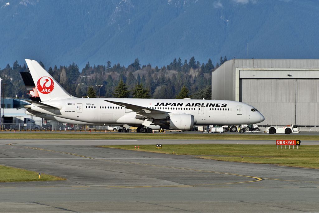 Boeing 787-8 (JA821J) - AOG on tow