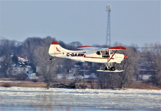 C-GAAW — - C-GAAW WAGAERO SUPER BROUSSE survolant le fleuve St-Laurent à Lavaltrie QC. le 09-02-2022 à 16:02