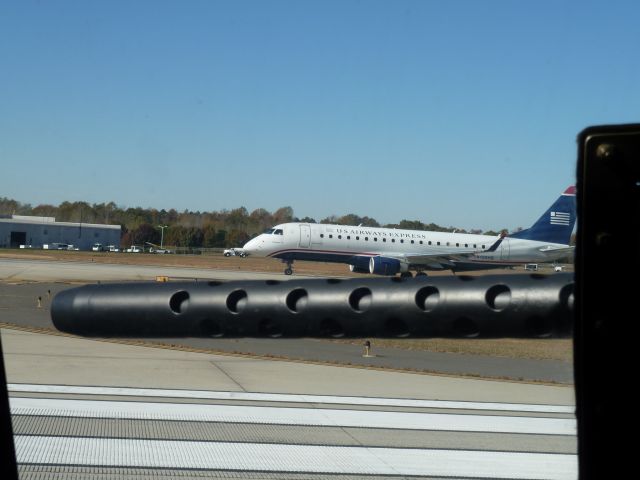 Embraer 170/175 (N125HQ) - Aluminum Overcast 11/8/2013 KCLT - Departing from KCLT 36R