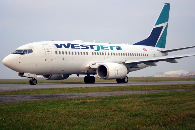 CFWAQ206 — - Boeing 737-700 heading owards rwy 25 for early morning departure.