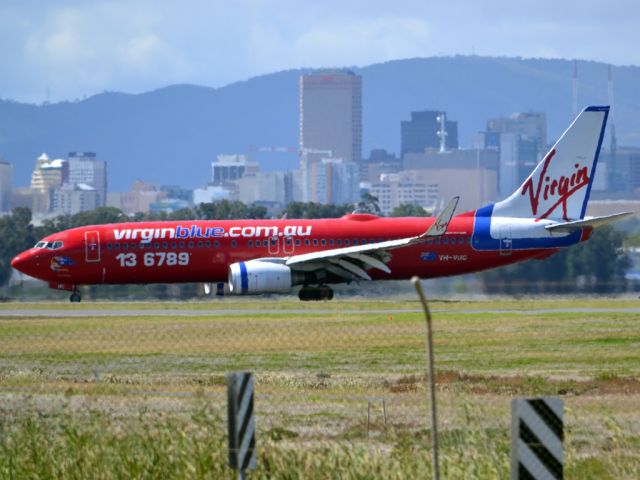 Boeing 737-800 (VH-VUC) - On taxi-way heading for Terminal 1, after arrival on runway 23.